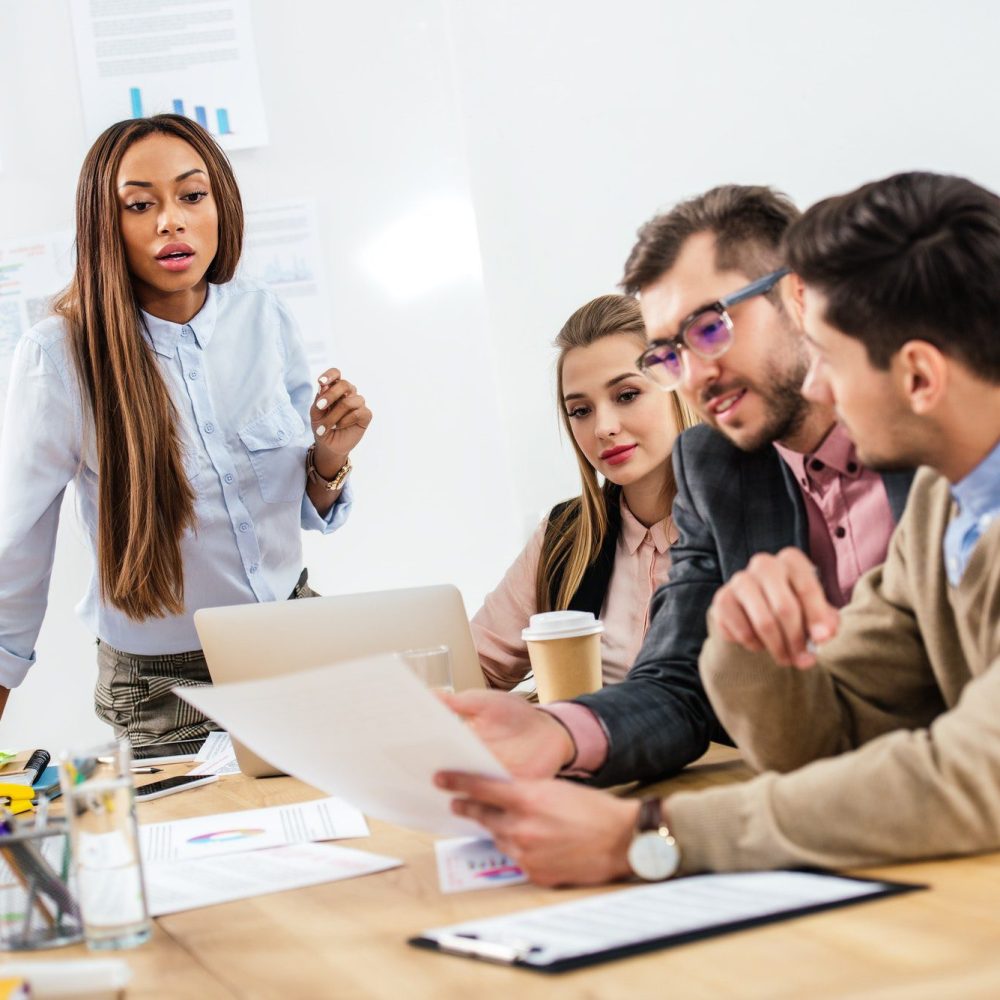 multicultural-group-of-marketing-managers-working-on-project-together-in-office.jpg